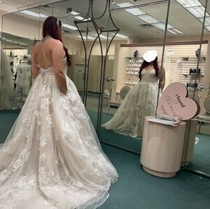 Brand new wedding dress, only tried on once, never tailored or actually worn.